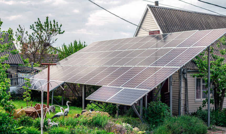 Solar panels on roof of the house renewable energy green power photovoltaic.